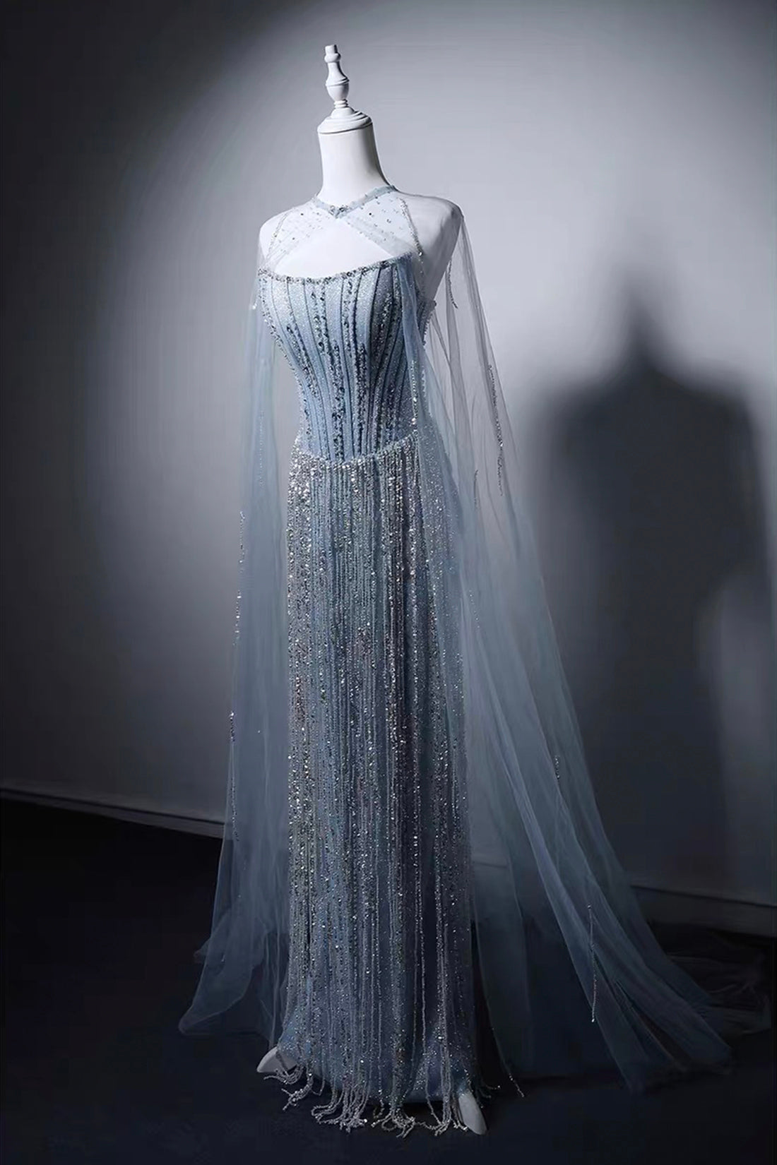 Elegant Light Blue Beaded Mermaid Gown with Detachable Tulle Cape