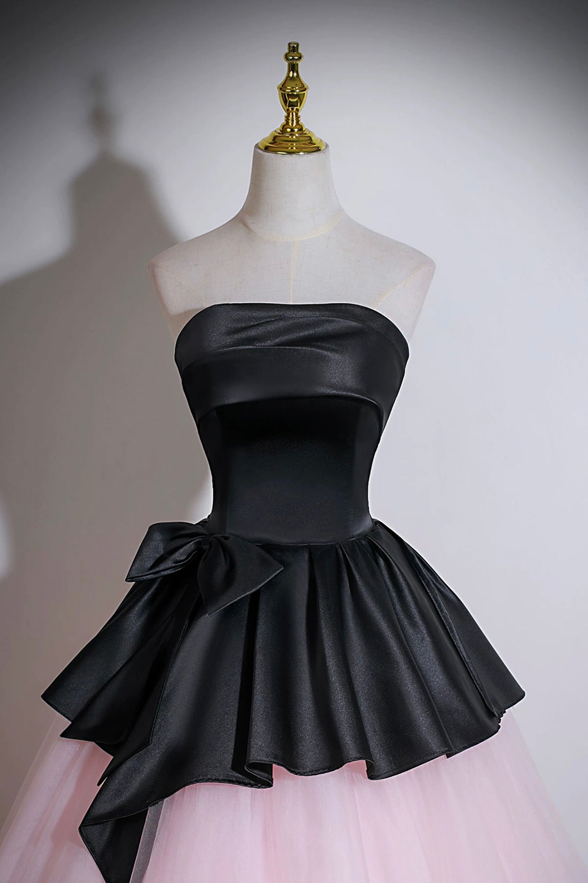 Elegant Strapless Evening Gown with Black Peplum and Pink Tulle Skirt Elegant Strapless Evening Gown with Black Peplum and Pink Tulle Skirt