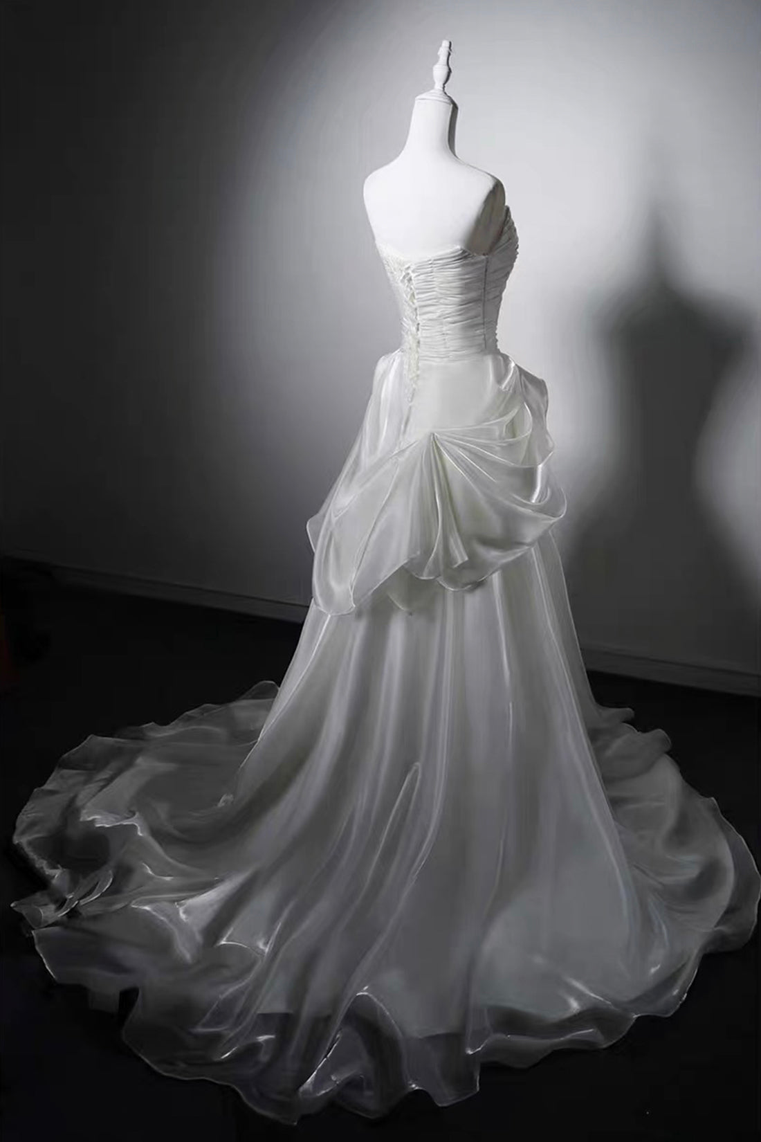 Ivory Strapless Ruched Satin A-Line Wedding Gown with Asymmetrical Draped Skirt