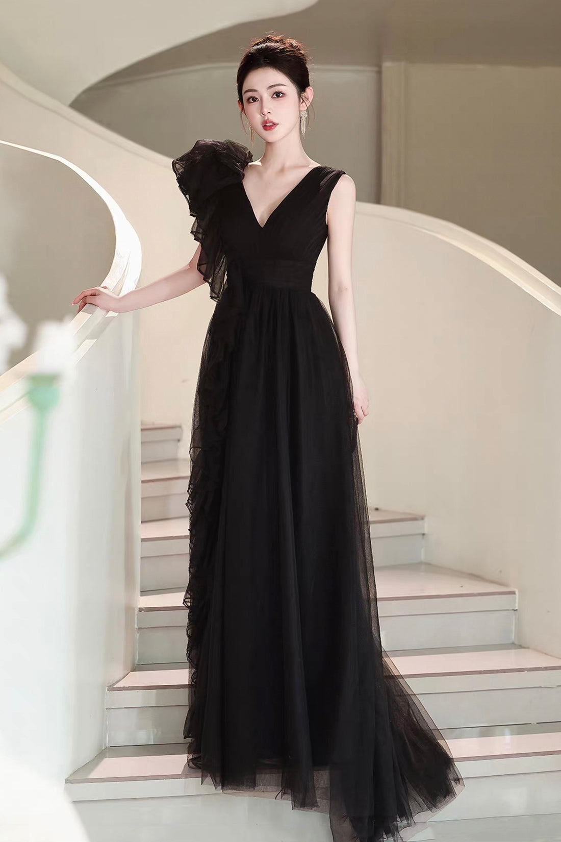 Sophisticated Black Tulle Evening Gown with Asymmetrical Ruffle Detail