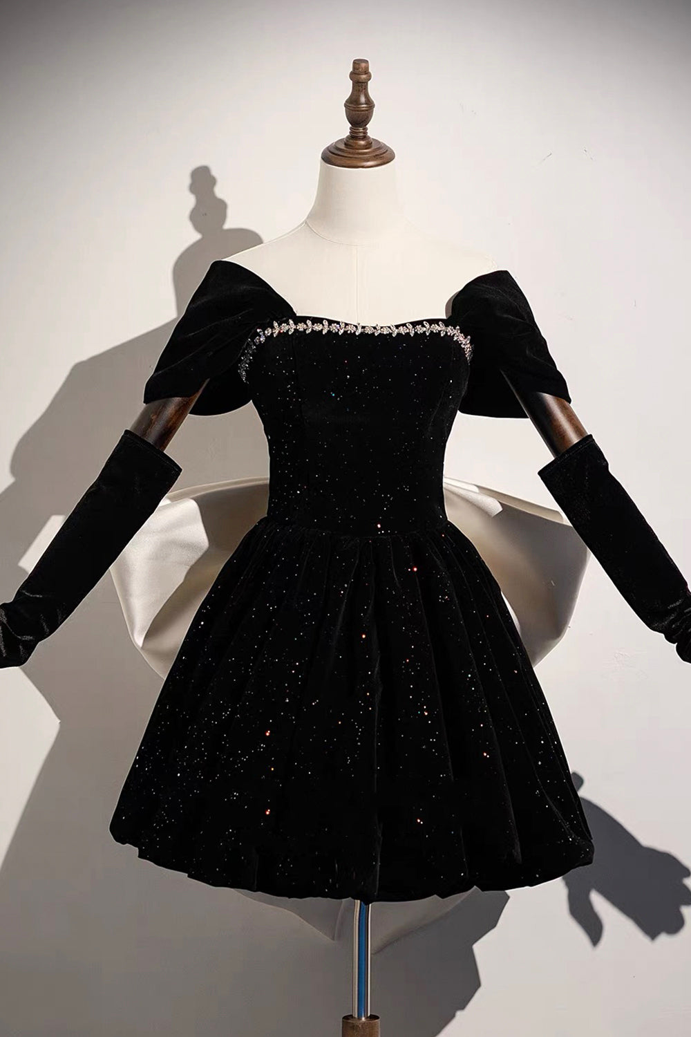 Black Sparkle Velvet Off-Shoulder Mini Dress – Crystal Neckline with Oversized White Satin Bow Back