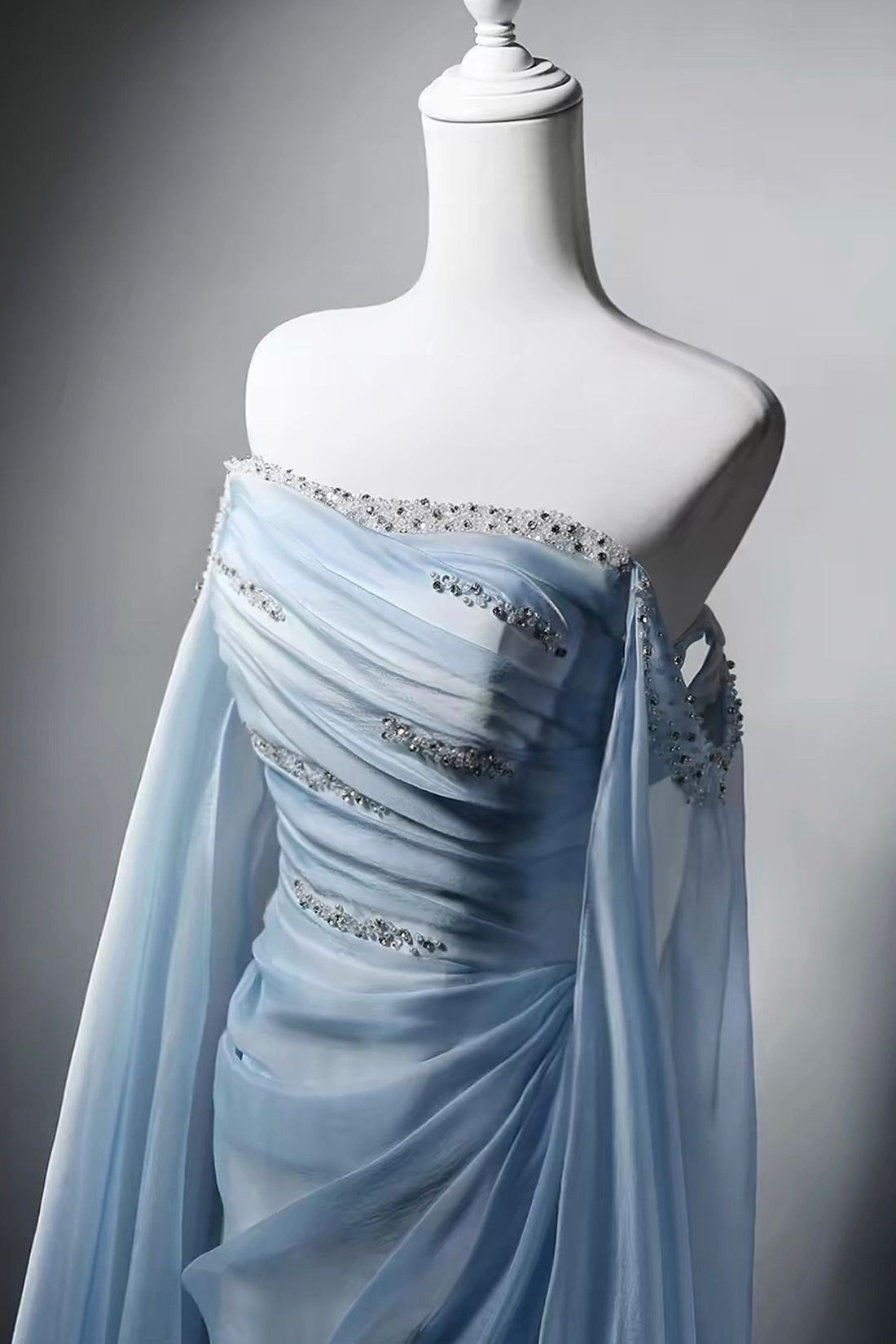 Elegant Light Blue Strapless Tulle Gown with Beaded Bodice