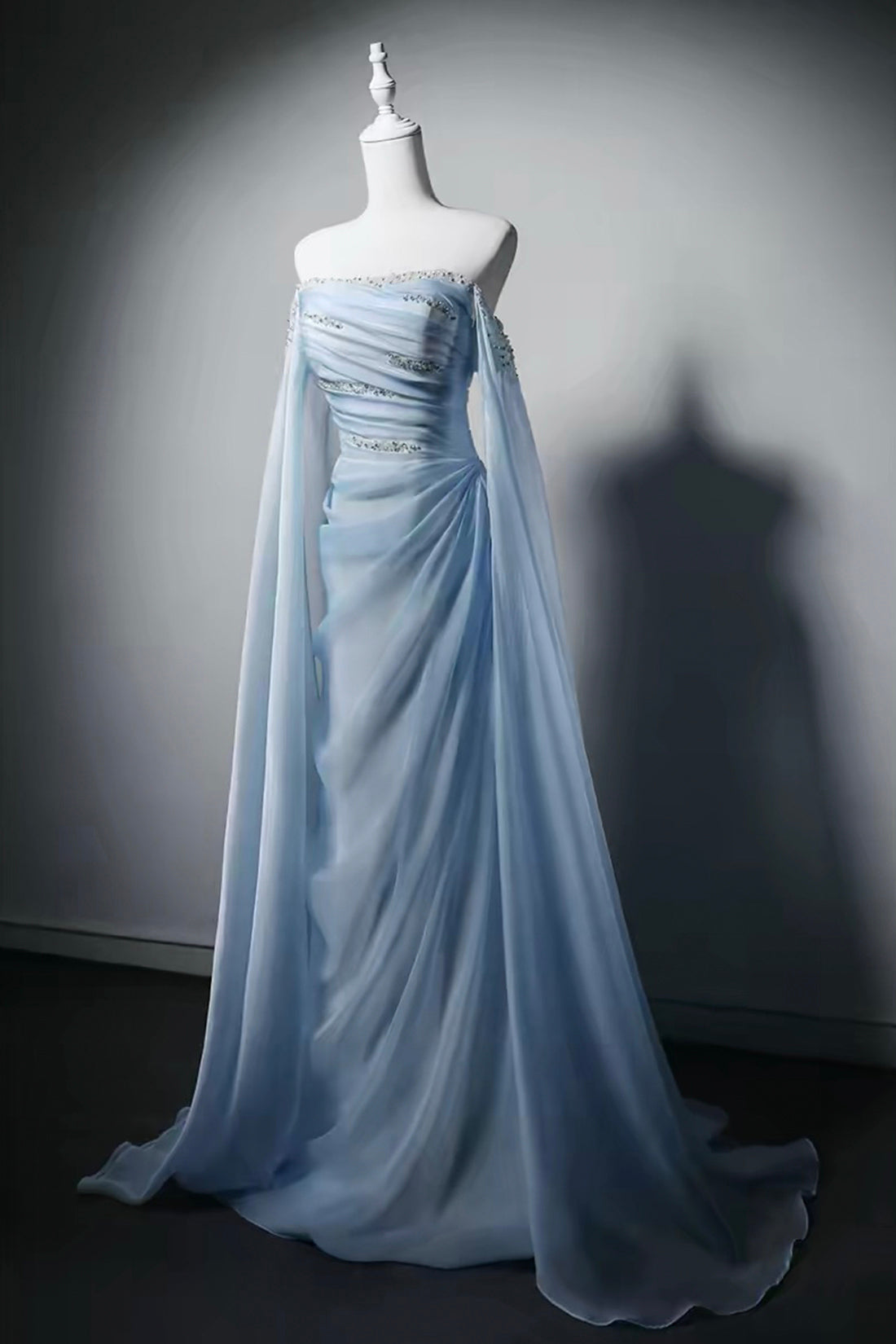 Elegant Light Blue Strapless Tulle Gown with Beaded Bodice