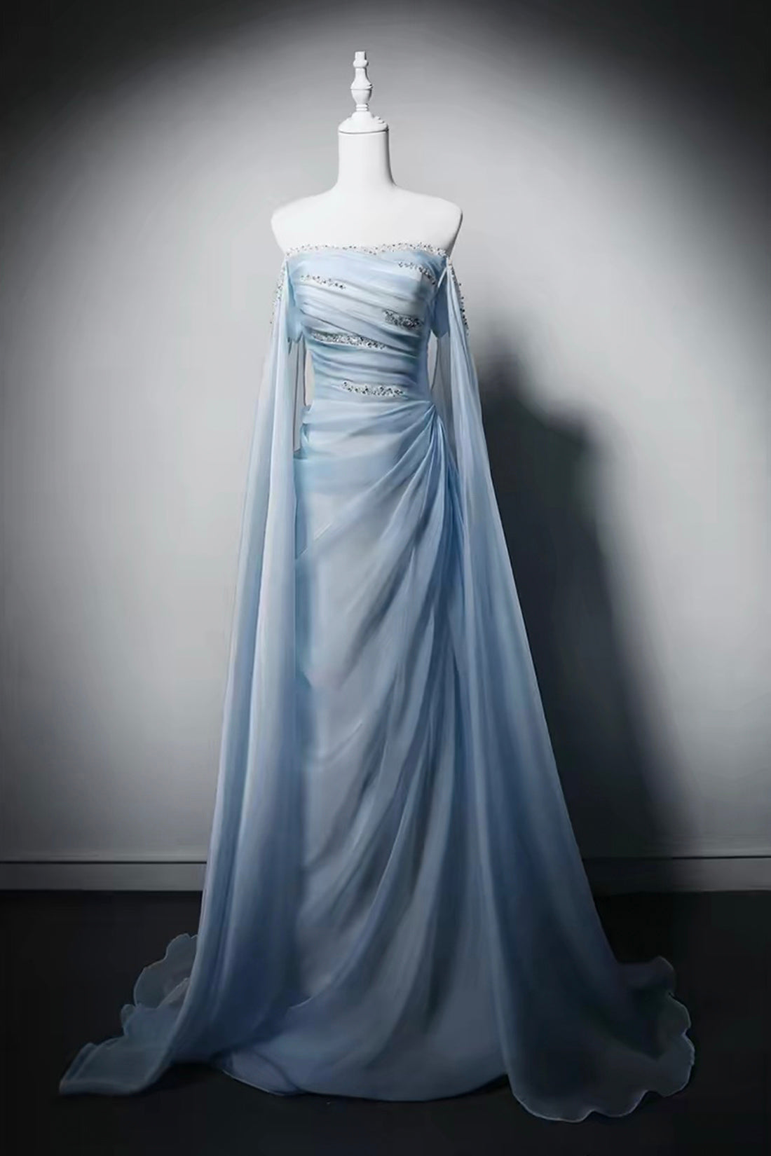 Elegant Light Blue Strapless Tulle Gown with Beaded Bodice