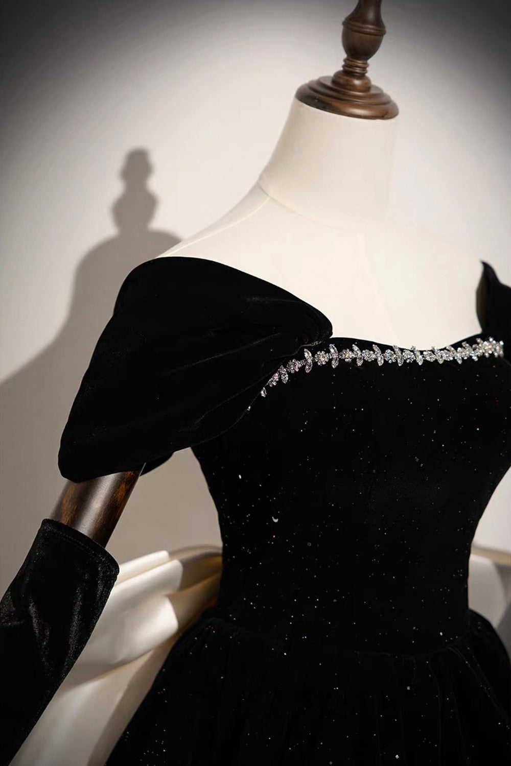 Black Sparkle Velvet Off-Shoulder Mini Dress – Crystal Neckline with Oversized White Satin Bow Back