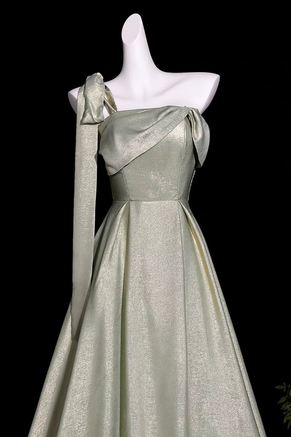 Sage Green Metallic One-Shoulder Gown with Sculptural Bow & Trailing Ribbon
