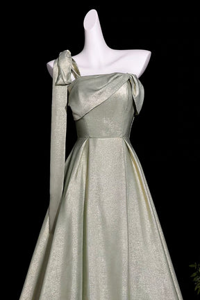 Sage Green Metallic One-Shoulder Gown with Sculptural Bow & Trailing Ribbon