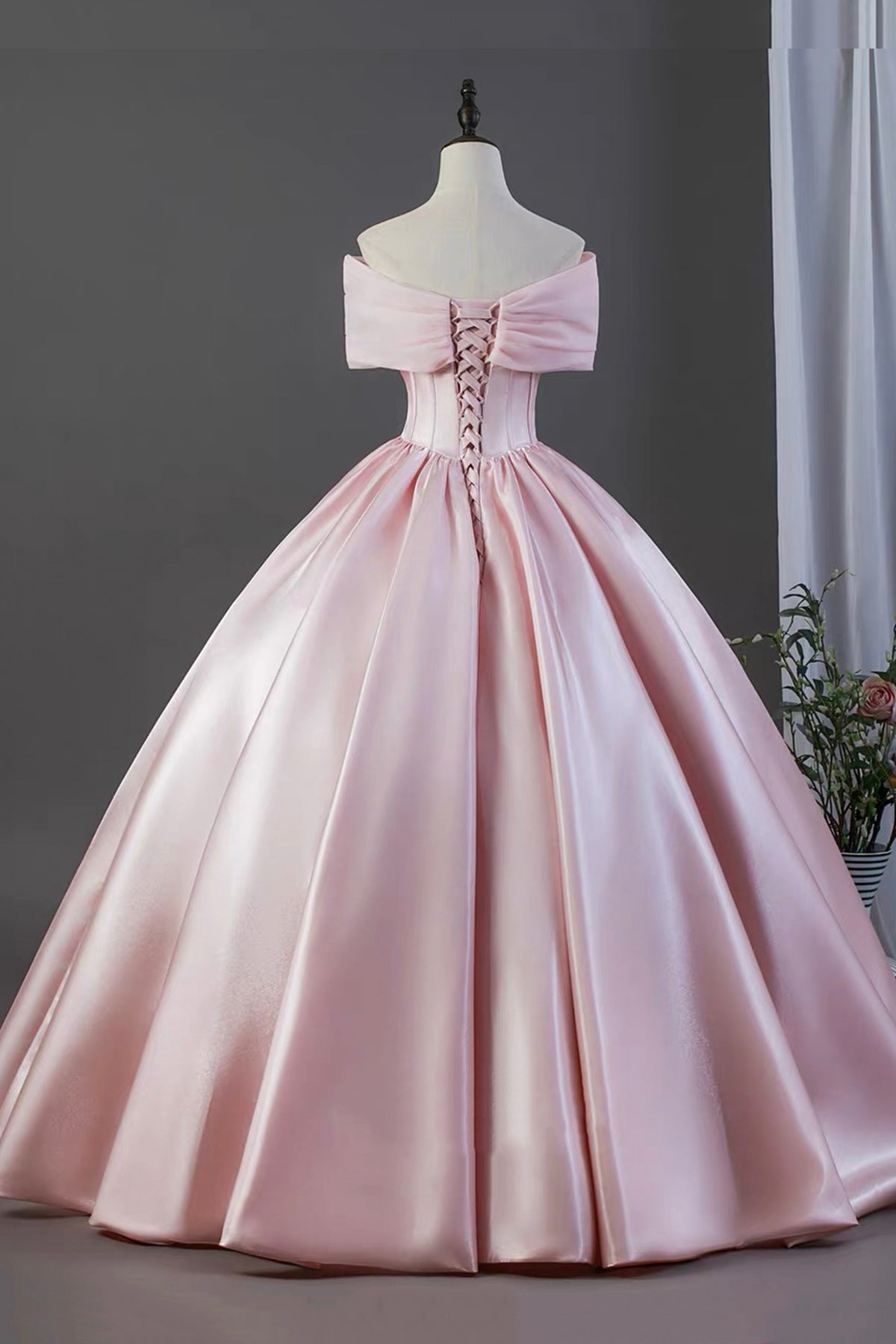 Pink Satin Off-the-Shoulder Ball Gown with Bow Detail – Elegant Formal Dress for Prom
