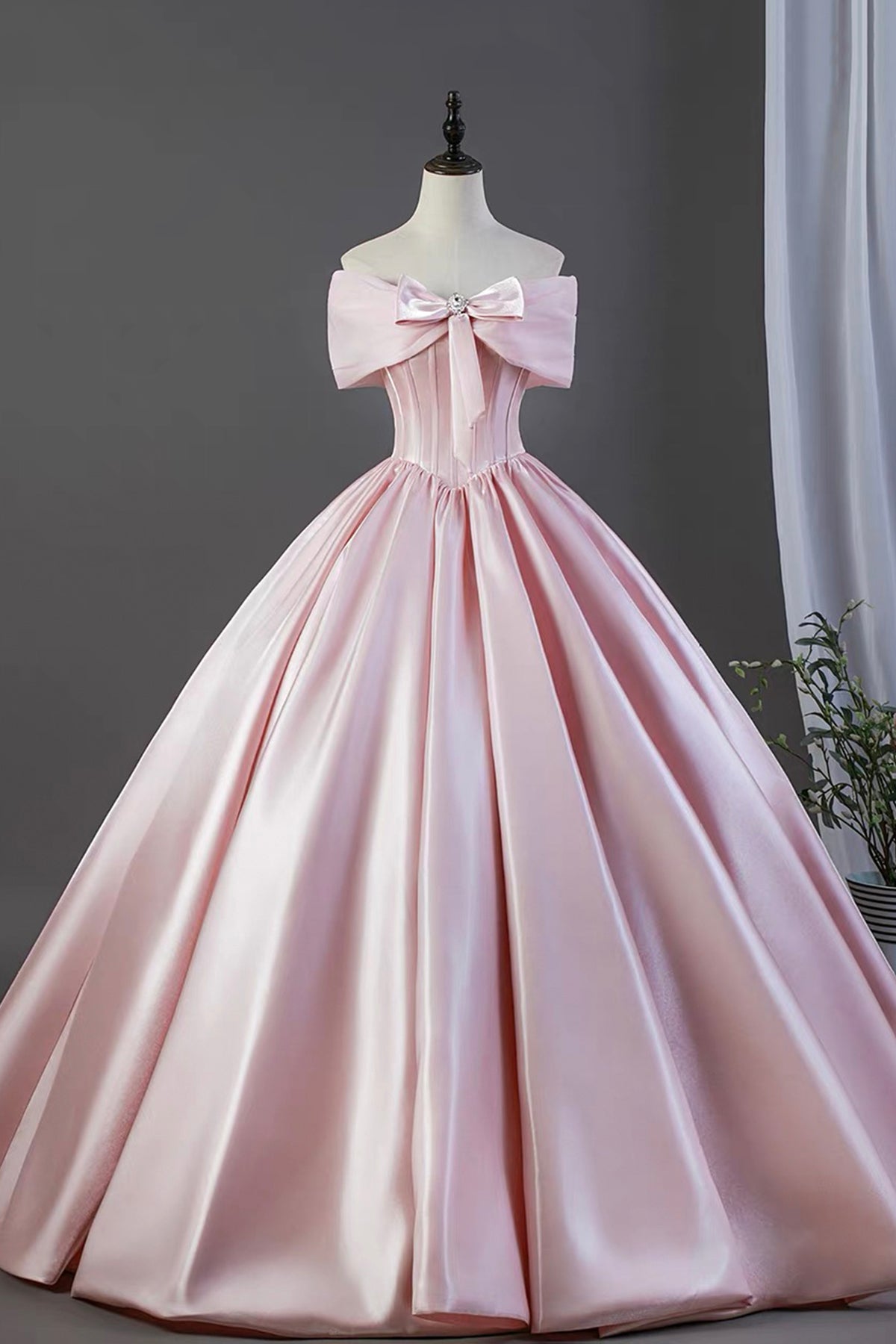 Pink Satin Off-the-Shoulder Ball Gown with Bow Detail – Elegant Formal Dress for Prom