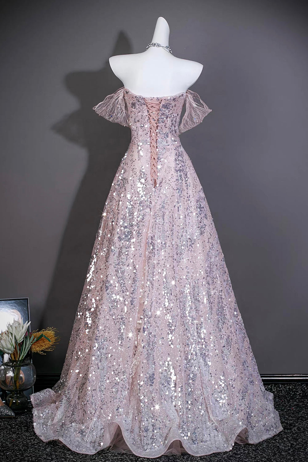 Pink Sequin Off-the-Shoulder Ball Gown with Ruffled Neckline