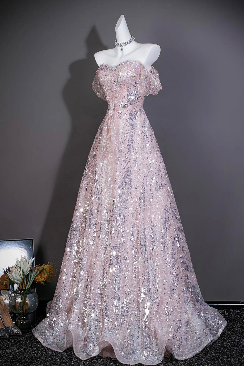 Pink Sequin Off-the-Shoulder Ball Gown with Ruffled Neckline