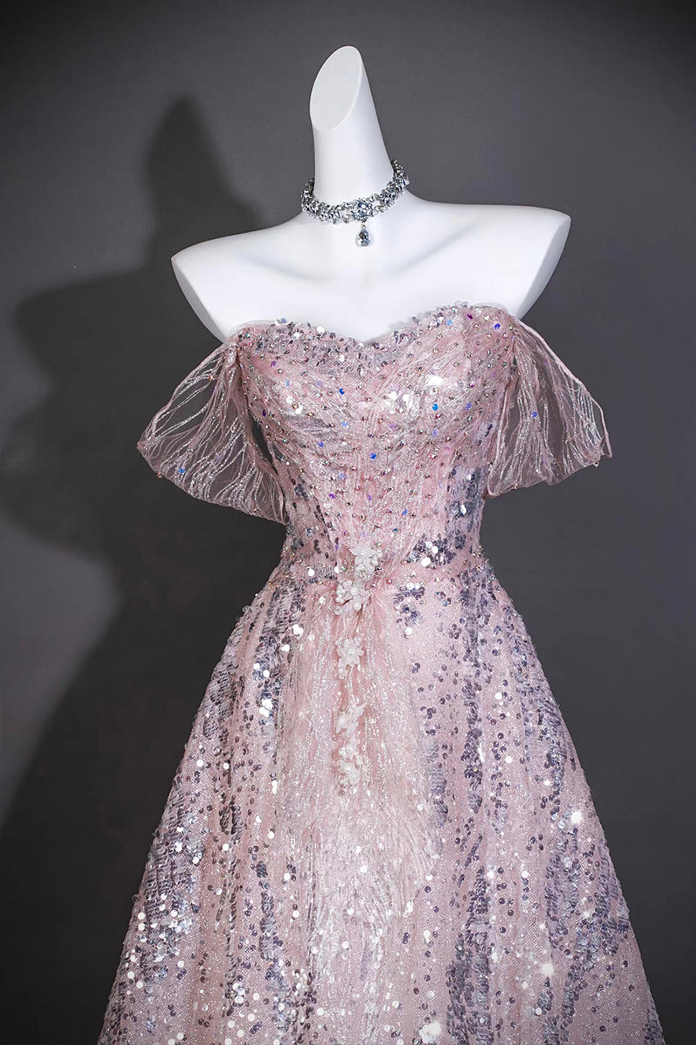 Pink Sequin Off-the-Shoulder Ball Gown with Ruffled Neckline