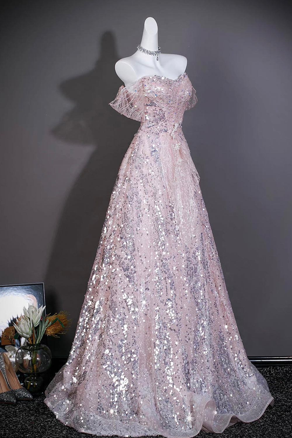 Pink Sequin Off-the-Shoulder Ball Gown with Ruffled Neckline